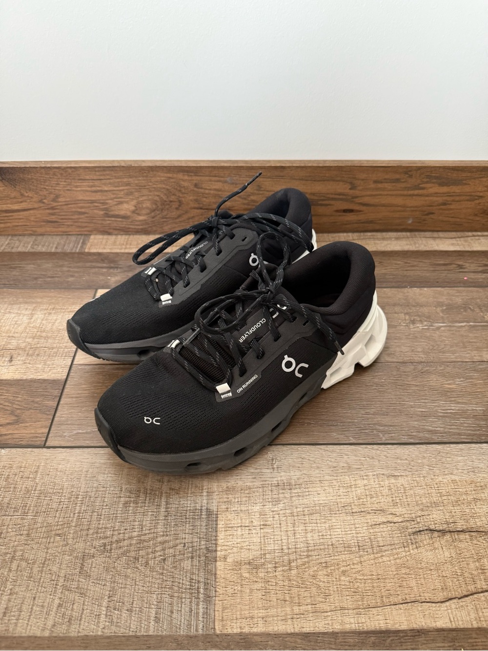On Running Men's Black and White Cloudnova Performance Trainers